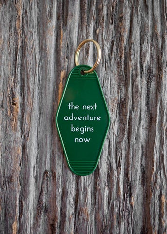THE NEXT ADVENTURE BEGINS NOW KEY TAG